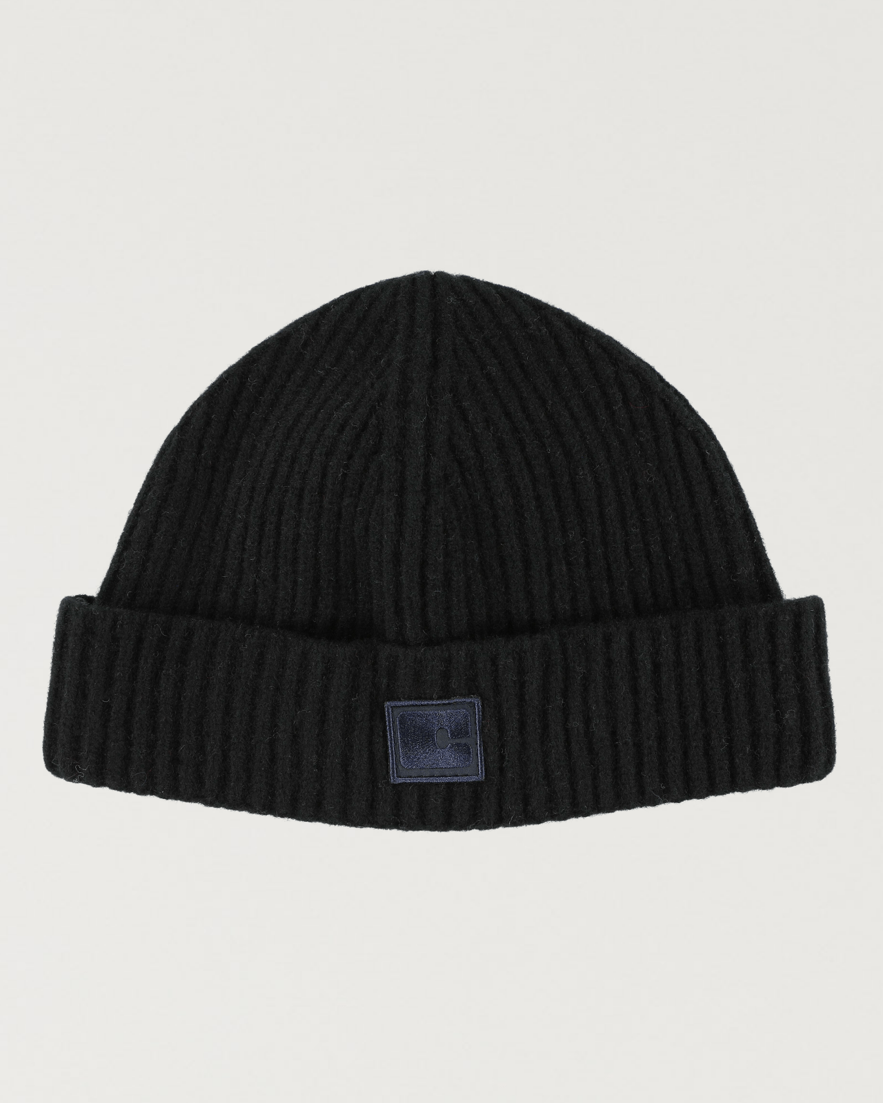 Black Antoni beanie from Castart with embroidered detail, made from 100% soft Scottish lambswool, comfortable and stylish.