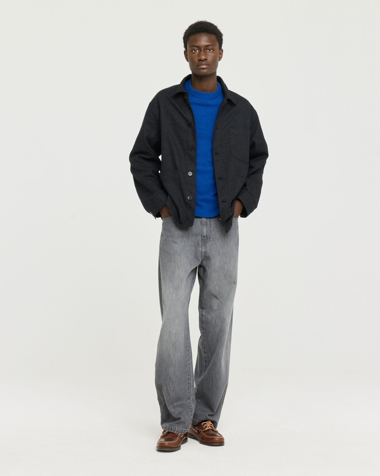 Lightweight merino wool blend knit made in Portugal with subtle contrast side detailing, soft and breathable for year-round layering.  