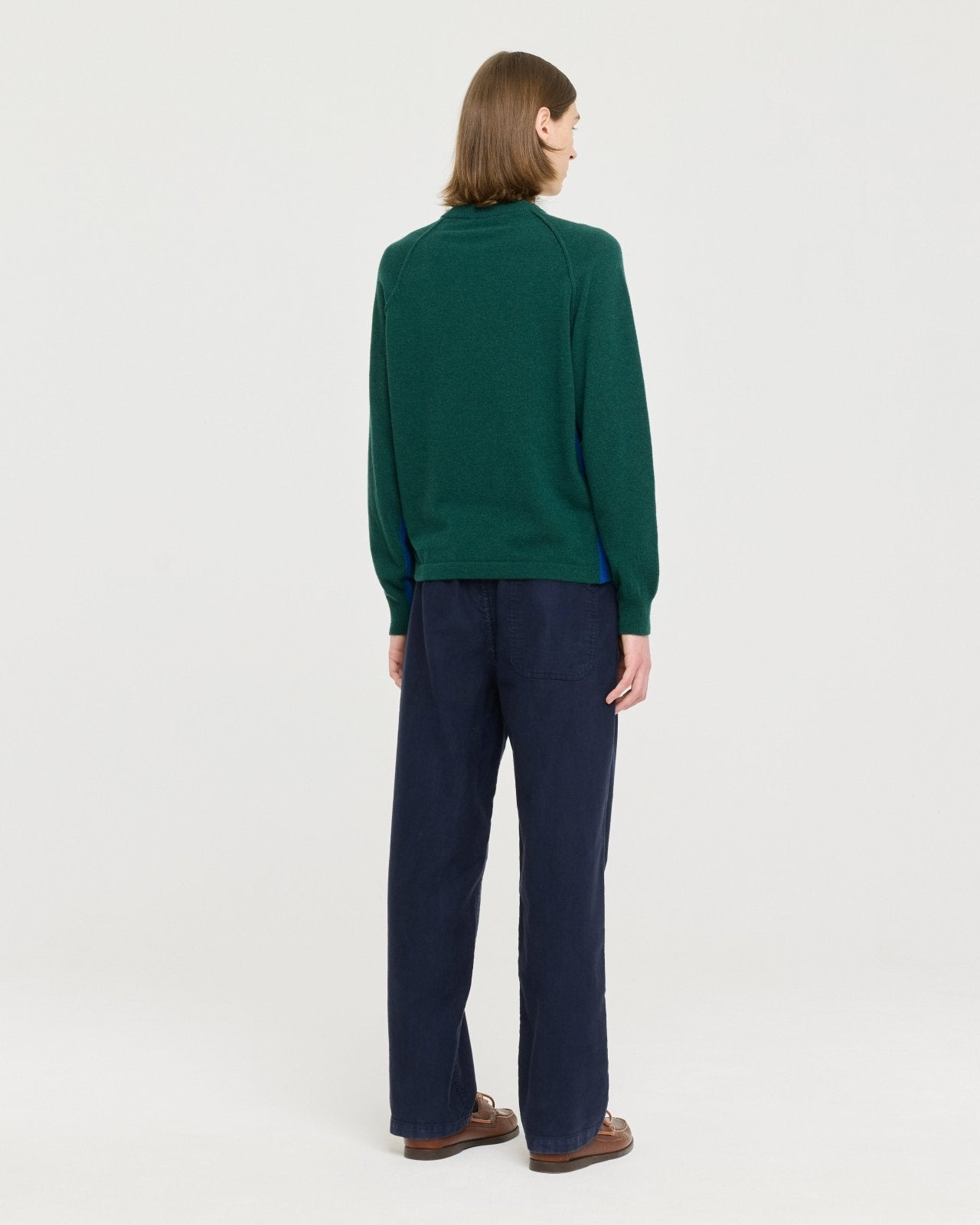 Lightweight merino wool blend knit made in Portugal with subtle contrast side detailing, soft and breathable for year-round layering.